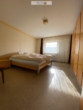 Schlafzimmer 1.OG - Wohnhaus mit 3 Wohneinheiten und einer Ladeneinheit