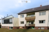 In den Stäffelen, 97996 Niederstetten Gartenansicht - Wohnhaus mit 3 Wohneinheiten und einer Ladeneinheit
