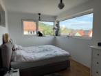 Schlafzimmer - Wohnanlage „Alte Kelterei“ 3-Zimmer-Wohnung im Penthouse mit TG-Stellplatz in Weikersheim.