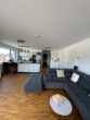 Wohn/ -Esszimmer mit offener Küche - Wohnanlage „Alte Kelterei“ 3-Zimmer-Wohnung im Penthouse mit TG-Stellplatz in Weikersheim.